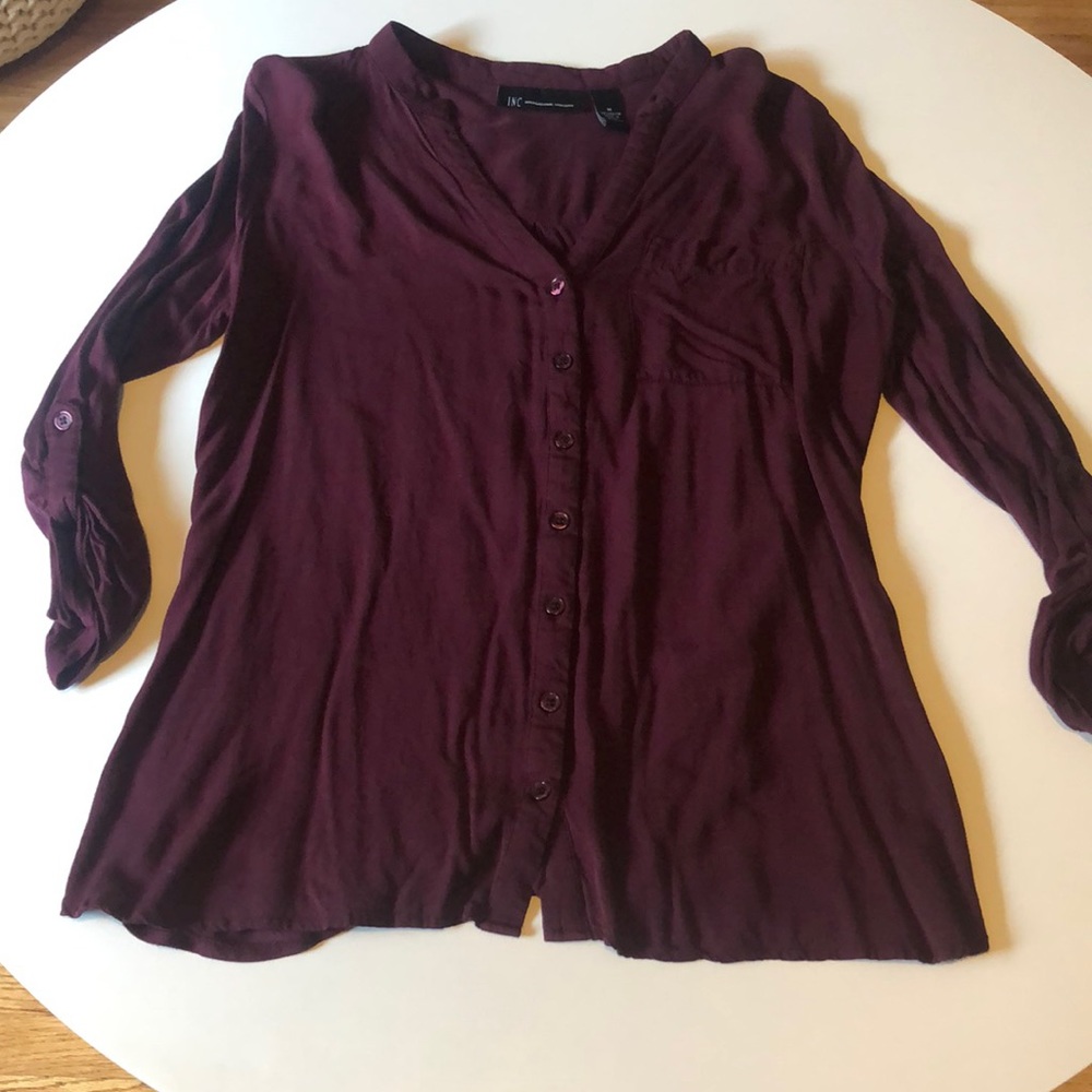 INC button down